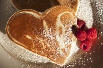 Heart Shaped Pancakes with Raspberries — Stock Photo