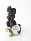 Black truffles, stacked — Stock Photo