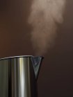 Steam rising from kettle — Stock Photo