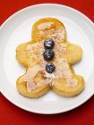 Pancake man with blueberries — Stock Photo