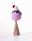 Raspberry ice cream with chocolate sauce — Stock Photo