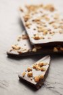 Chocolate bar with nut brittle — Stock Photo