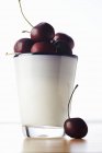 Black Cherries in Cup — Stock Photo