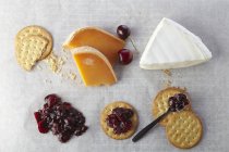 Assorted Cheese on baking paper — Stock Photo