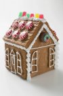 Gingerbread house on white — Stock Photo
