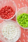 Jelly beans in plastic tubs — Stock Photo