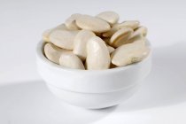 White beans in ceramic bowl — Stock Photo