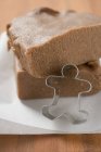 Gingerbread dough and cutter — Stock Photo