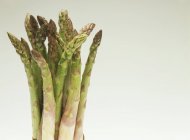 Green asparagus with drops of water — Stock Photo