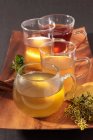 Elevated view of various herb teas in tea cups — Stock Photo