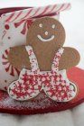 Gingerbread man over sugar — Stock Photo