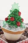 Christmas cupcake on chocolate muffins — Stock Photo