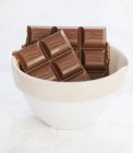 Chocolate in white bowl — Stock Photo