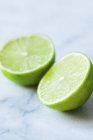 Fresh halved lime — Stock Photo