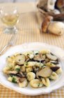 Closeup view of Gnocchi with Porcini mushrooms — Stock Photo