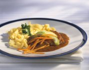 Braised beef with spaetzle — Stock Photo