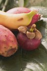 Mangosteen with prickly pears and banana — Stock Photo