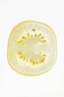 Кусок жёлтого помидора — стоковое фото