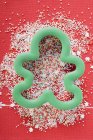 Closeup top view of cookie cutter on colored sprinkles — Stock Photo