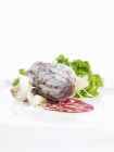 Salami with garlic and lettuce — Stock Photo