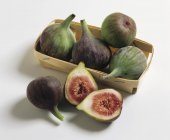 Green fresh figs in box — Stock Photo