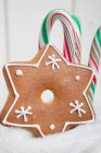 Gingerbread star and candy — Stock Photo