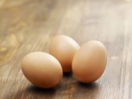 Three brown eggs — Stock Photo