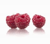 Three ripe raspberries — Stock Photo
