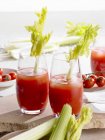 Bloody Mary with celery in glasses — Stock Photo