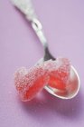 Two jelly hearts on silver spoon — Stock Photo