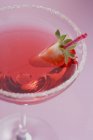 Martini with liqueur & strawberry in glass — Stock Photo