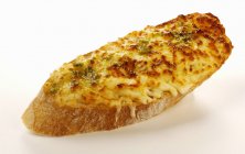 Cheese and pesto on toast — Stock Photo