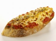 Tomatoes and mozzarella on toast — Stock Photo