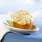 Closeup view of apricot stuffed with Amaretto almond foam — Stock Photo