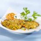 Carrot and courgette pancakes — Stock Photo