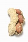 Unshelled peanut and opened — Stock Photo