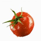 Tomato with drops of water — Stock Photo