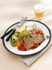 Herbed meatloaf with sauce — Stock Photo