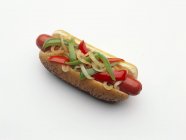 Hot Dog on Bun with Onion and Peppers — Stock Photo