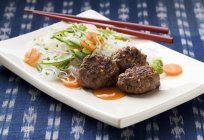 Meatballs with rice noodles — Stock Photo