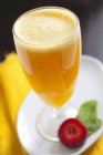 Glass of orange juice serving — Stock Photo