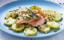 Salmon with potato salad — Stock Photo