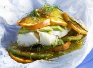 Cod with orange baked in foil — Stock Photo