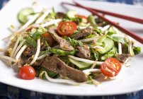 Oriental salad with strips — Stock Photo
