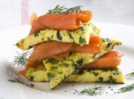 Basil omelette with smoked salmon — Stock Photo