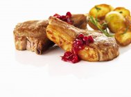 Roasted Lamb chops with cranberries — Stock Photo