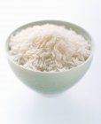 Schüssel mit ungekochtem weißen Reis — Stockfoto