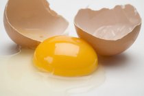 Egg cracked and open — Stock Photo