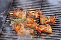 Chicken wings with rosemary — Stock Photo