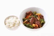 Fried beef with vegetables and rice — Stock Photo